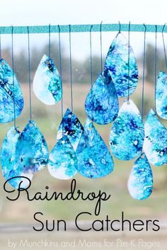 raindrop sun catchers are hanging from the side of a window with text overlay reading rainbow sun catchers by munchins and moms for prek pages