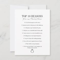 a card with the words top 10 reasons written in black ink on white paper next to a marble background