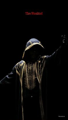 a person in a black robe and gold chains on their face, with the words'dark