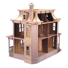 a wooden doll house is shown on a white background