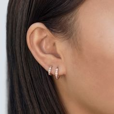 These Rose Gold Vermeil Huggie Hoop earrings will be your favorite everyday pairs. Our Huggies are true to size and will hug your ear perfectly. Great for smaller lobes or second piercings. 14K Rose Gold over Sterling Silver Cubic Zirconia Crystals Hypoallergenic, lead and nickel free Thickness 2mm Inside Diameter Sizes: 6.5mm, 9mm Snap closure #E008-RG Dainty Rose Gold Tarnish-resistant Huggie Earrings, Everyday Rose Gold Huggie Earrings, Classic Rose Gold Huggie Earrings For Pierced Ears, Rose Gold Small Hoop Huggie Earrings For Everyday, Rose Gold Small Hoop Piercing For Gift, Rose Gold Small Hoop Piercing As Gift, Rose Gold Tarnish Resistant Huggie Earrings, Hypoallergenic Rose Gold Huggie Earrings, Rose Gold Small Hoop Piercings For Gift