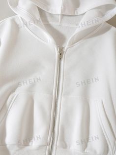 Style:Casual \nNeckline:Hooded \nDetails:Pocket \nType:Zip Up \nDetails:Zipper \nSleeve Type:Drop Shoulder \nColor:White \nPattern Type:Plain \nSleeve Length:Long Sleeve \nLength:Crop \nFit Type:Regular Fit \nFabric:Slight Stretch \nMaterial:Fabric \nComposition:100% Polyester \nCare Instructions:Machine wash or professional dry clean \nTemperature:Spring/Fall (18-25℃/63-77℉) \nSheer:No \n Cropped Zipper Hoodie Outfit, Hoodie Outfit Hijab, Plain Hoodies, Women Sweatshirts, Outfit Hijab, Crop Hoodie, Hoodie Outfit, Zip Up Jacket, Zipper Hoodie