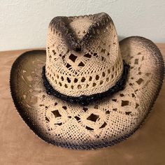 Black and Tan Straw Cowboy Hat Vintage Look with Black Beaded Hat Band and Black Antique on Crown and around Brim. This is a very fun hat to have in your wardrobe.  It will go with jeans/dress and boots for a fun day or for a night on the town. One Size fits most with soft elastic band on inside of hat Black Country Style Brimmed Straw Hat, Black Country Style Straw Hat For Western-themed Events, Black Adjustable Hat Band For Western-themed Events, Black Wide Brim Straw Hat For Western-themed Events, Luxury Black Vintage Cowboy Hat, Beaded Hat Bands, Straw Cowboy Hat, Beaded Hat, Chapeau Cowboy