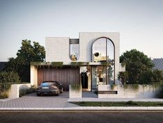 a car is parked in front of a modern house