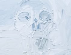 an abstract painting with white paint on the face and hands, in shades of blue