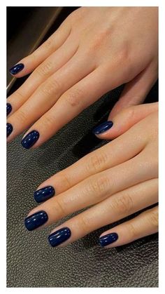 Captivate with the magnetic allure of cat eye nails! Perfect for adding a touch of mystery and sophistication to your summer look. Gel Nails Color Ideas, Short Nails Dark Colors, Autumn Nails Blue, Fall Navy Nails, Short Navy Nails, Fall Nails Navy, Dark Blue Short Nails, Dark Blue Sparkle Nails, 1940s Nails