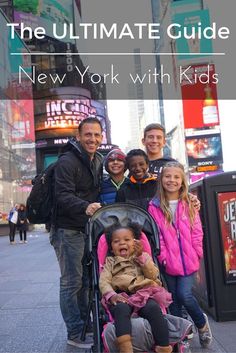 a group of people standing next to each other in front of a building with the words, the ultimate guide new york with kids