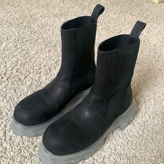 Size 42 Or Us 9. Never Worn. Black Suede. Notched Sole Black High-top Chelsea Boots With Rubber Heel Cap, Edgy Round Toe Platform Boots With Vibram Sole, Edgy Black Platform Boots With Vibram Sole, Leather Platform Boots With Abzorb Midsole And Round Toe, Black Ankle Platform Boots With Studded Outsoles, Black Studded Ankle Platform Boots, Black Chelsea Boots With Lug Sole For Streetwear, Black High-top Chelsea Boots With Platform, Black Chelsea Boots With Vibram Sole