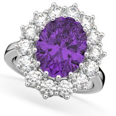 Style Number - AZ16271
This prestigous diamond accented amethyst ring is inspired by the engagement ring worn by Princess Diana and Princess Kate Middleton. This unique and luxurious ring makes a statement with its 12x10mm genuine and natural oval shaped purple amethyst that is complemented by 14 brilliant-cut round near-colorless diamonds of G-H Color, SI Clarity in an oval halo fashion. The purple colored gemstone and clear diamond stones rest on a remarkably stunning platinum band.This Lady D Luxury Purple Amethyst Ring With Halo Setting, Luxury Amethyst Ring With Halo Setting, Luxury Purple Diamond Ring For Formal Occasions, Luxury Vvs Clarity Amethyst Ring For Formal Occasions, Luxury Amethyst Rings With Halo Setting, Luxury Lavender Amethyst Ring With Center Stone, Luxury Lavender Amethyst Ring For Anniversary, Luxury Amethyst Ring With Brilliant Cut Diamond, Luxury Purple Diamond Ring With Accent Stones