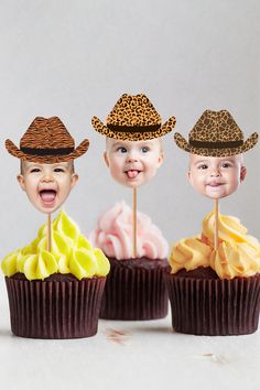 three cupcakes decorated with cowboy hats and yellow frosting on top of each other