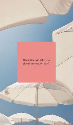 there are many white umbrellas with a pink square in the middle that says, discipline will take you places motivation can't