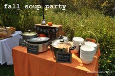 a table topped with lots of pots and pans