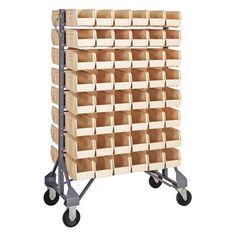 a metal rack with many bins on it and two wheels that are holding several boxes