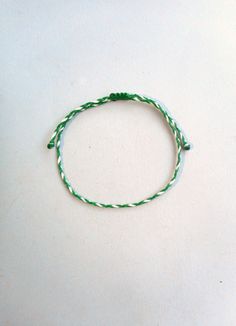 Braided bracelet,Waxed cord bracelet , Unisex, Water proof string, Surfer aesthetic, Adjustable bracelet Mens bracelet Gift for him This simple yet beautifull bracelet is made using durable waxed string. It is adjustable with a sliding knot closure. Other evil eye bracelets from my shop: https://www.etsy.com/shop/LuckyRatJewellery?section_id=14785936&ref=shopsection_leftnav_5 Other charm bracelets in my shop: https://www.etsy.com/shop/LuckyRatJewellery?section_id=16685466&ref=shopsection White Braided Bracelets With Sliding Knot Nylon Cord, White Braided Nylon Cord Bracelet With Adjustable Length, White Braided Bracelet With Adjustable Cord For Everyday, White Waxed Cord Friendship Jewelry, White Braided Bracelet With Sliding Knot Nylon Cord, White Braided Bracelets With Adjustable Length, Everyday White Waxed Cord Bracelets, White Braided Bracelet With Adjustable Length, White Braided Bracelet With Sliding Knot