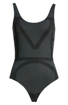 A deeply scooped back and high-cut waist ensure you get plenty of sun in this one-piece swimsuit traced with logo lettering. Moderate back coverage 73% recycled polyamide, 27% elastane Dry clean Made in Portugal SPACE: A shop for emerging and advanced designers Black Logo Print Swimwear For Summer, Black Swimwear With Logo Print For Swimming, Modern Swimwear For Summer Sports, Modern Sports Swimwear For Summer, Gift Logo, High Cut, Print Gifts, One Piece Swimsuit, Portugal