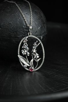 ITEM DESCRIPTION: The size H 5 cm x W 4 cm (2 x 1 1/3 inch). Weight - 5 g. You can buy it with a silver chain or without it. I made this Foxglow pendant of sterling silver, rhodolite and rose quartz. This flower pendant looks so touching and elegant. The botanical necklace is really worthy of being in your precious collection. Expect many compliments on this! This handmade necklace will come to you in a gift box - ready for gifting. The parcel will be sent 1-2 days after payment. Delivery usuall Unique Silver Necklace With Flower Pendant, Feminine Silver Flower Pendant Necklace, Silver Necklace With Intricate Flower Pendant, Silver Botanical Jewelry With Flower Pendant, Unique Nickel-free Flower Pendant Necklace, Woodland Jewelry, Organic Jewelry, Floral Necklace, Floral Jewellery