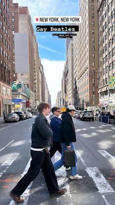 three men walking across the street in new york city, with one carrying a briefcase