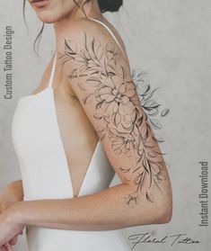 a woman with a flower tattoo on her arm and shoulder is looking at the camera