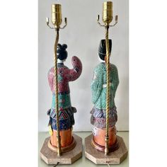 Lovely pair of  Art Deco porcelain Chinese table lamps from 30's. Man and woman on traditional costumes with double bases in wood and marble. Lamp pole is in solid brass. Lamps were newly professionally rewired and the both take standard bulbs. Vivid colors and very elegant. Harps, shades and finials are included. Dimension below are without shade and height is to the top of the sockets. With shade, lamps are: W 13"x D 13"x L 30.75". Chinese Lamp, Chinese Table, Brass Lamps, Porcelain Figures, Art Deco Table Lamps, Marble Lamp, Porcelain Lamp, Wood And Marble, Asian Antiques