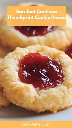 some cookies with jelly on them and the words barefoot contessa thumpprint cookie recipe