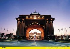 a person is standing in front of an arch