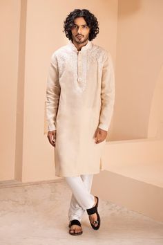 Peach linen kurta with placement dori embroidery on front. Paired with a contrasting plain aligadhi. - Aza Fashions Festive Linen Traditional Wear With Resham Embroidery, Traditional Linen Kurta With Resham Embroidery, Traditional Embroidered Linen Wear, Embroidered Linen Traditional Wear, Traditional Linen Kurta For Eid, Traditional Linen Wear For Eid, Festive Linen Traditional Wear, Festive Traditional Linen Wear, Festive Linen Kurta With Embroidered Border