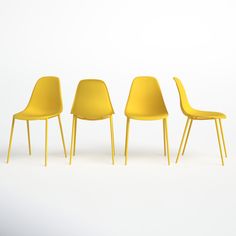 three yellow chairs sitting next to each other