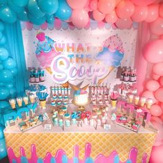 an ice cream parlor with balloons and decorations on the wall, including cake, cupcakes, and candy bars