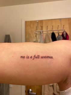 a person with a tattoo saying no is a full sentence