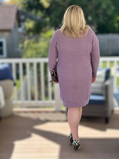 A stunning and cozy piece for your winter wardrobe. This dress features a rich lavender hue that adds a touch of sophistication and elegance to your look. Made with a soft and warm knit fabric, it provides both comfort and style. The sweater dress silhouette offers a flattering fit, hugging your curves in all the right places. The unique feature of this dress is the cable knit pattern, adding a subtle twist to the classic design. Whether you're heading to a holiday party or a brunch date, our Pu Purple Knee-length Winter Dress, Elegant Purple Sweater For Fall, Elegant Purple Sweater For Winter, Fitted Lavender Long Sleeve Sweater, Fitted Long Sleeve Lavender Sweater, Mauve Long Sleeve Winter Sweater, Fitted Lavender Winter Sweater, Fitted Cozy Purple Sweater, Lavender Fitted Cardigan For Fall