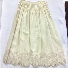 Sample Item Never Worn. Embroidery Embellished Bottom. Side Zip. Fully Lined. Elegant Long Skirt With Floral Embroidery, Elegant Embroidered Summer Skirt, Elegant Long Embroidered Skirt, Elegant White Skirt With Embroidered Hem, Elegant Bottoms With Embroidered Hem For Spring, Spring Formal Embroidered Skirt, Elegant Embroidered Mini Skirt, Spring Formal Cotton Skirt, Elegant Embroidered Skirt