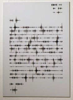 an image of sound waves on a piece of white paper with black lines in the middle