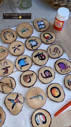 several wood slices with different designs on them