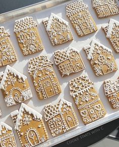 a tray filled with lots of cut out ginger cookies