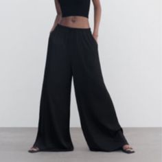 Palazzo- Wide Leg Black Pants With Pull String Elastic Waist. Size Small Chic Wide-leg Harem Pants, Solid Color Wide Leg Pants For Night Out, Casual Black Wide Leg Dress Pants, Black Dress Pants With Loosely Fitted Hips For Spring, Black Dress Pants Loosely Fitted For Spring, Black High-waisted Relaxed Fit Dress Pants, Wide Leg High-waisted Pants For Night Out, Solid High-waisted Wide Leg Pants For Night Out, Black Relaxed Fit High-waisted Dress Pants