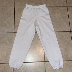 Different Sweat Pants Sz Small Youth White New Without Tags 50% Cotton. 50% Polyester White Full-length Cotton Joggers, White Full Length Cotton Joggers, Casual White Plain Pants, White Cotton Full Length Joggers, Casual White Pants With Ribbed Waistband, Basic White Sweatpants For Loungewear, Basic White Bottoms With Pockets, Basic White Bottoms With Elastic Waistband, Basic White Bottoms For Loungewear