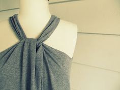 a woman's gray top on a mannequin