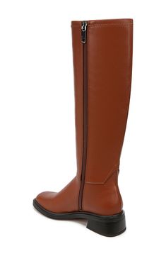 Classic details lend a refined appearance to this tall boot that's the perfect go-to for elevating in-office or off-duty looks. 1 3/4" heel; 6" shaft; 9 3/4" calf circumference Synthetic upper, lining and sole Imported Classic Tall Heeled Boots For Fall, Wide Calf Tall Boots For Workwear, Tall Boots With Reinforced Heel, Tall Medium Width Boots For Work, Tall Medium Width Work Boots, Medium Width High Shaft Boots For Work, Tall Boots For Fall, Wide Calf Knee-high Boots With Round Toe For Office, Wide Calf Knee-high Boots For Office With Round Toe