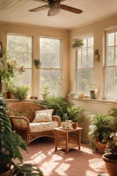 Sunlit room with large windows, filled with potted plants, wicker furniture, and a small table set for tea. Small Cottage Sunroom Ideas, Tiny Sunroom Office, Furniture For Sunroom Room Ideas, Vintage Sunroom Ideas, Decorate Sunroom, Cozy Sunrooms, Sun Nook, Southern Sunroom, Small Sunroom Addition