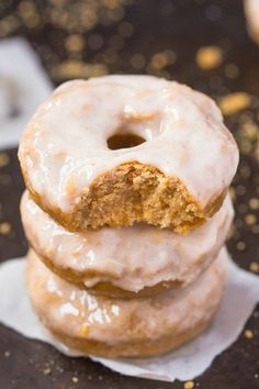 three glazed donuts stacked on top of each other