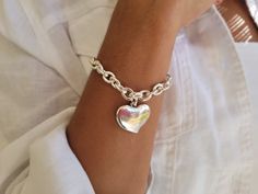 "Silver Chain Bracelet, heart pendant, lobster clasp. The chain, heart pendant and lock clasp are made of Zamak silver plated with sterling silver, free of lead, nickel, cadmium. Hypoallergenic. Can be easily maintained with a polishing cloth. Heart dimensions 0.86\" x 0.98\" or 22mm x 25mm This bracelet is fun and easy to wear. It also makes a great gift idea. Your bracelet comes wrapped for gift giving. Thank you for visiting my shop! How to care your plated items: Do not use any chemicals or Heart Link Bracelet, Chunky Gold Bracelet, Chain Bracelet For Women, Charm Bracelet Silver, Chain Heart, Silver Heart Bracelet, Nice Jewelry, Chunky Bracelet, Bracelet Heart