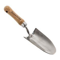 a stainless steel shovel with wooden handle