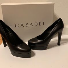 New In Box Authentic Casadei Platform Black Leather Heels Size It 38 Made In Italy * If You Are Not Familiar With This Luxury Brand Or Italian Luxury Footwear, They Run Small. I Would Suggest Someone With A Size 7 For These Beautiful Shoes. I Wear An 8 And These Are Sadly Too Small These Are Absolutely Beautiful And Classic Shoes! Msrp $875 No Lowball Offers Please Cs2 Party Heels With Leather Lining And Block Heel, Party Block Heels With Leather Lining, Modern Leather Court Shoes For Party, Modern Office Heels With Leather Lining, Modern Business Heels With Leather Lining, Modern Leather Heels For Formal Occasions, Sleek Party Heels With Leather Lining, Modern Calf Leather Court Shoes For Formal Occasions, Modern Formal Heels With Leather Sole