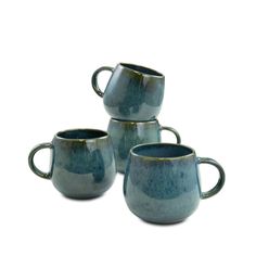 four blue mugs stacked on top of each other