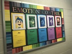 a colorful wall with posters on it that say emotion control