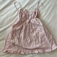 Super Cute Light Pink Revolve Mini Dress. Fabric Similar To Linen? Never Worn, Tags Still On -Adjustable Straps -Replacement Button (Too Short For 5’11”+) Cute Sleeveless Mini Dress With Tie Back, Cute Pink Mini Dress With Tie Back, Casual Spaghetti Strap Dress For Sleepover, Linen Short Dress, Revolve Dresses, Dresses Pink, Linen Short, Too Short, Babydoll Dress