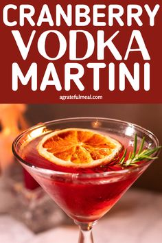 the cranberry vodka martini is garnished with orange slices and rosemary