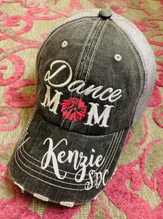 Mom hats. Dance mom hats. * Embroidered, distressed, womens, trucker caps. * Adjustable velkro, hole for pony. Customize and of my sports mom hats!! $22.00 hat. $27 name OR number. $32 name AND number. $37 name, number and BLING! 40 hand placed Swarovski Crystals. Ballet, tap and jazz! Gray hat with adjustable Vel-kro and hole for pony. Mesh is soft and flexible. One size fits all. Dance. Volleyball. Softball. Baseball. Cheer. Soccer. Basketball. Football. Lacrosse. Hockey. Dance mom hats. Dance Dance Team Gifts, Pink Ballet Shoes, Pink Pom Poms, Pink Football, Dance Teacher Gifts, Gray Hat, Softball Gifts, Tennessee Football, Personalized Hats