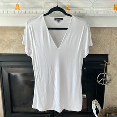 White, Inc Deep V Neck Tee Shirt! Longer Length (Approx 27 1/2” From Shoulder To Hem). The Deeper V Neck Is Very Flattering! Basic V-neck Summer Shirt, White Stretch V-neck Shirt, Teal Shorts, Studded Shorts, Womens Black Shorts, Black Lace Shorts, Sequin Tee, Long Tee, Grey Tie Dye