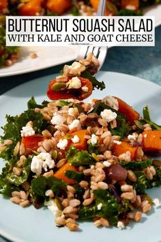 a salad with carrots, spinach and feta cheese is on a plate